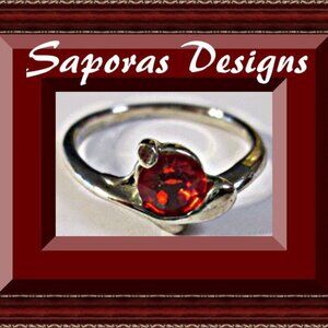 Size 7 Silver Tone Ring With Red Crystal